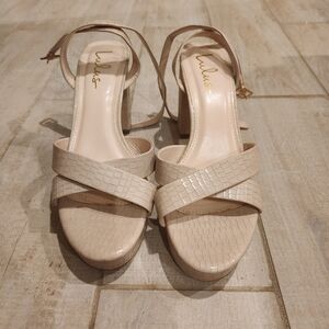 Nude platform heels